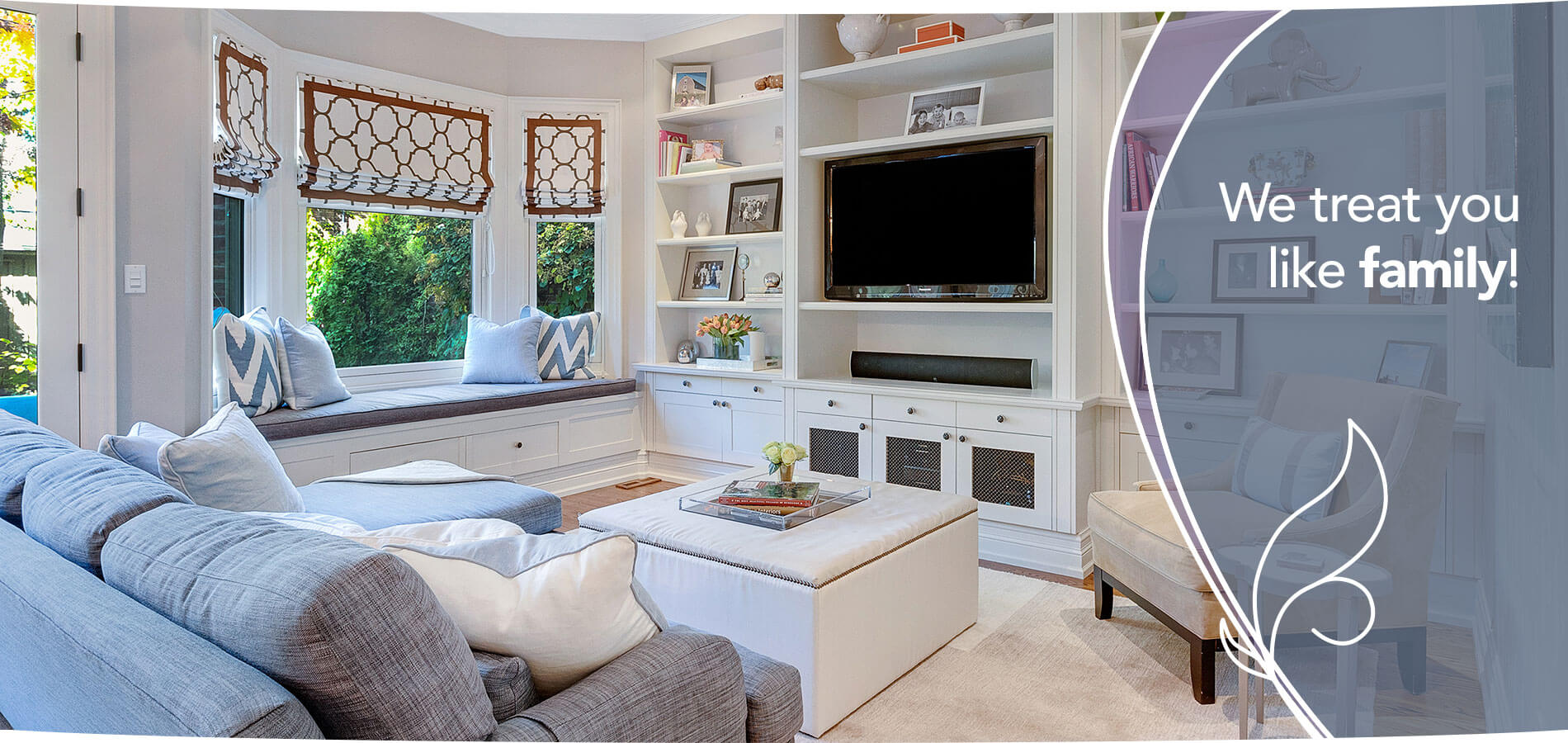Bright, staged San Francisco living room with built-in shelving and a bay window seat — Primavera Realty