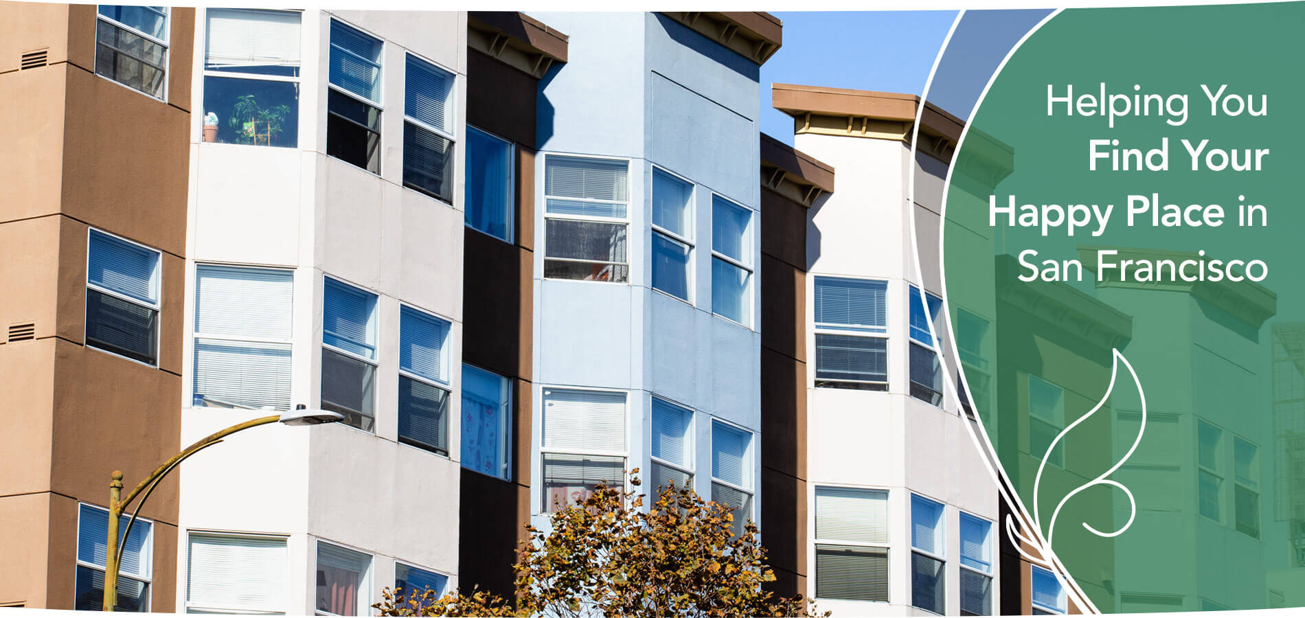 Colorful San Francisco apartment building facades with bay windows — Primavera Realty